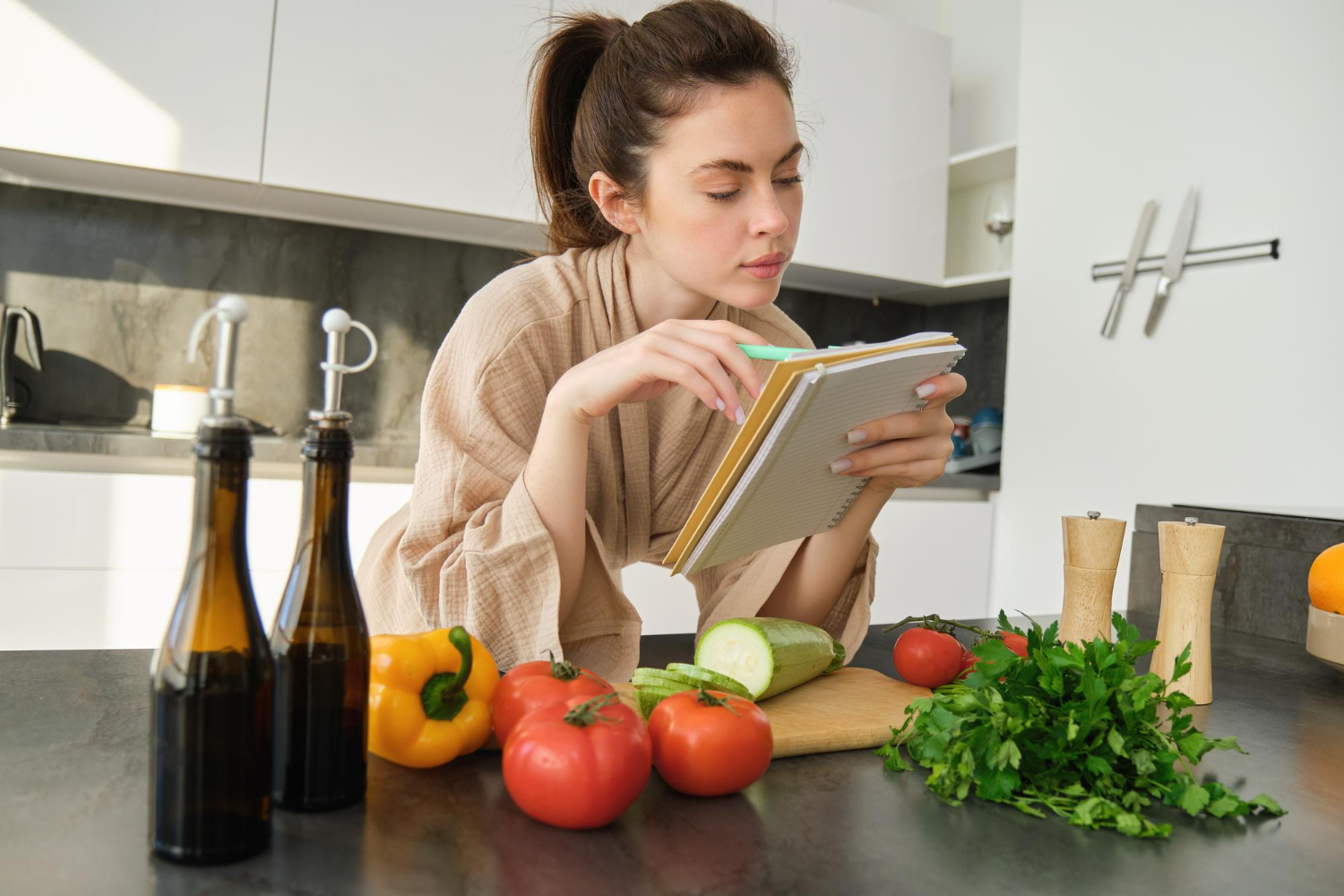 Meal prep for busy people with portioned containers on kitchen counter