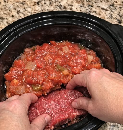 Slow Cooker Amish Swiss Steak with Tomato Gravy
